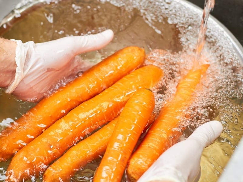 Washing fresh carrots 